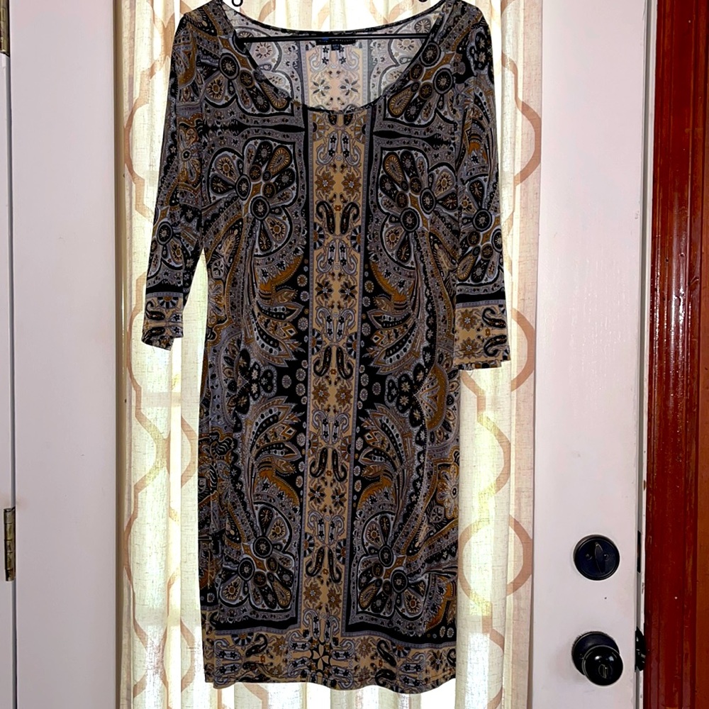 Sheath dress, knee length.